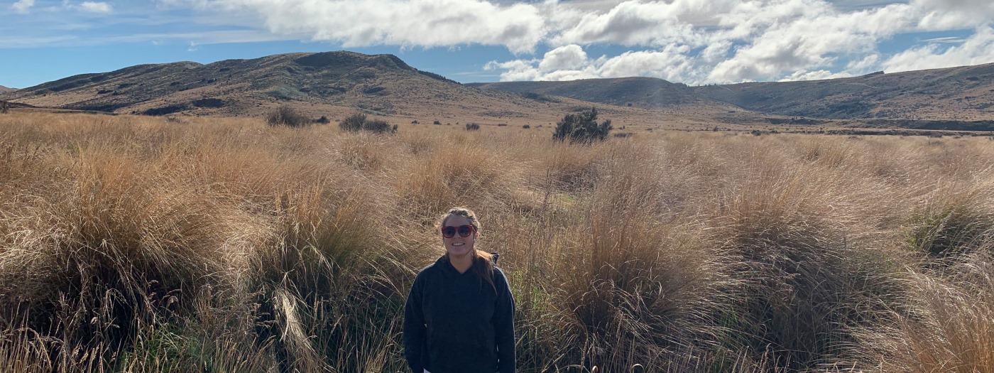 Kyra in tussock field